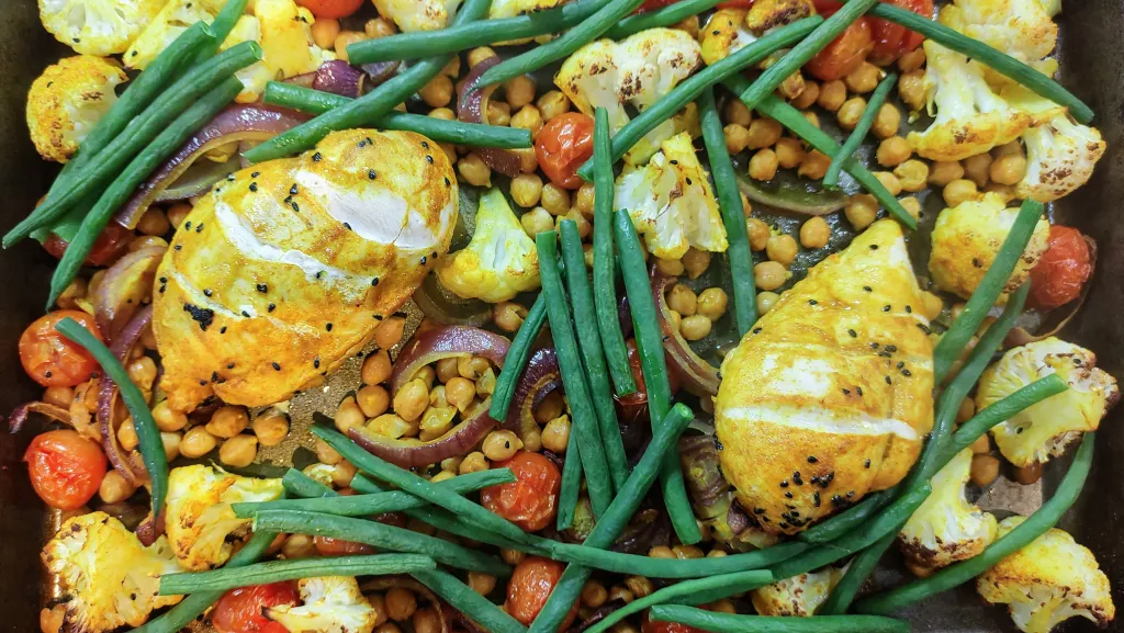 Photograph of 5-a-day turmeric traybake chicken.