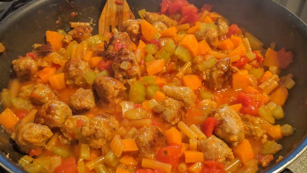 Photograph of Bean & pasta meatball stew.