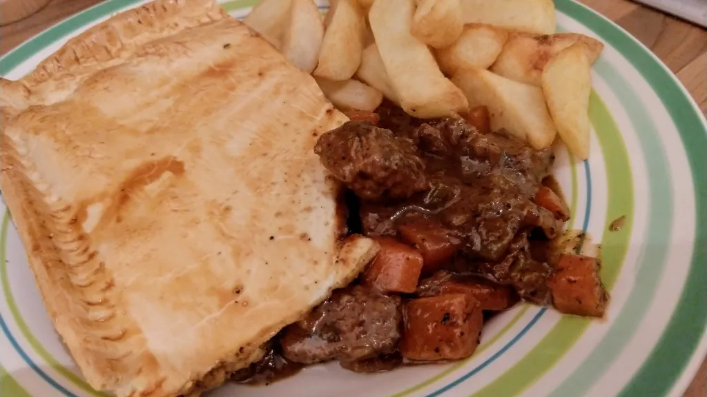Photograph of Beef & ale slice pie.