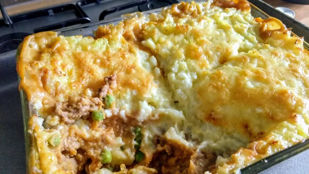 Photograph of Beef & lentil cottage pie with cauliflower & potato topping.