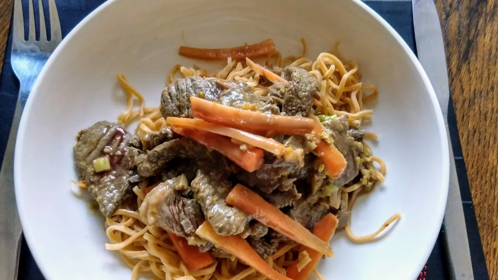 Photograph of Beef strips with orange and ginger.