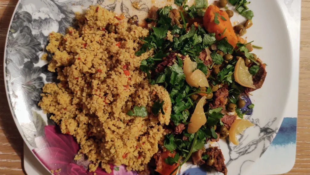 Photograph of Beef tagine with sweet potatoes, peas, ginger and ras el hanout.