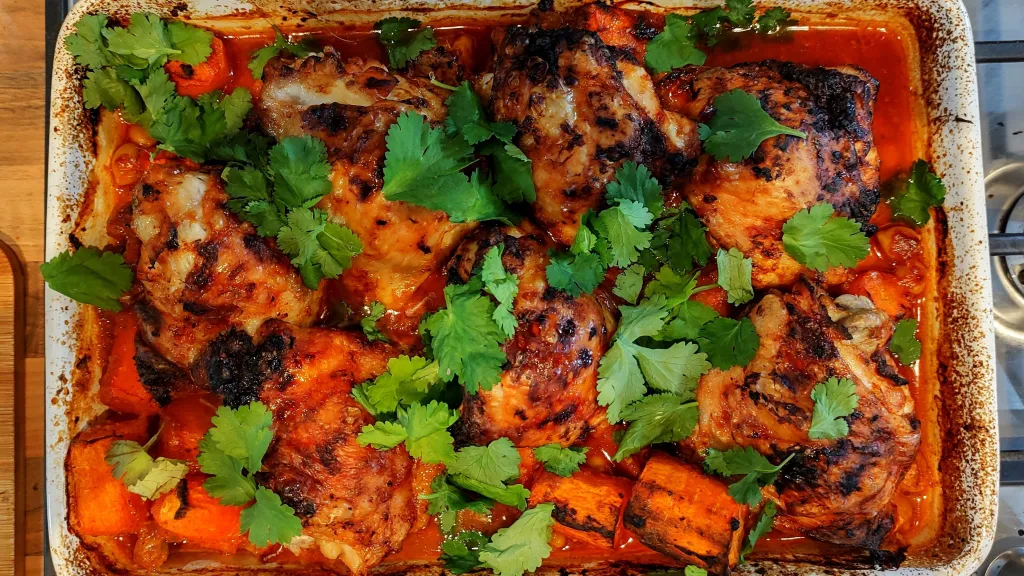 Photograph of Berbere spiced chicken, carrots and chickpeas.