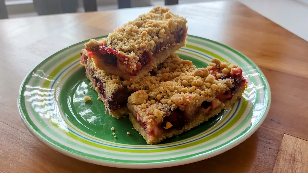 Photograph of Blackberry and apple hedgerow crumble bars.