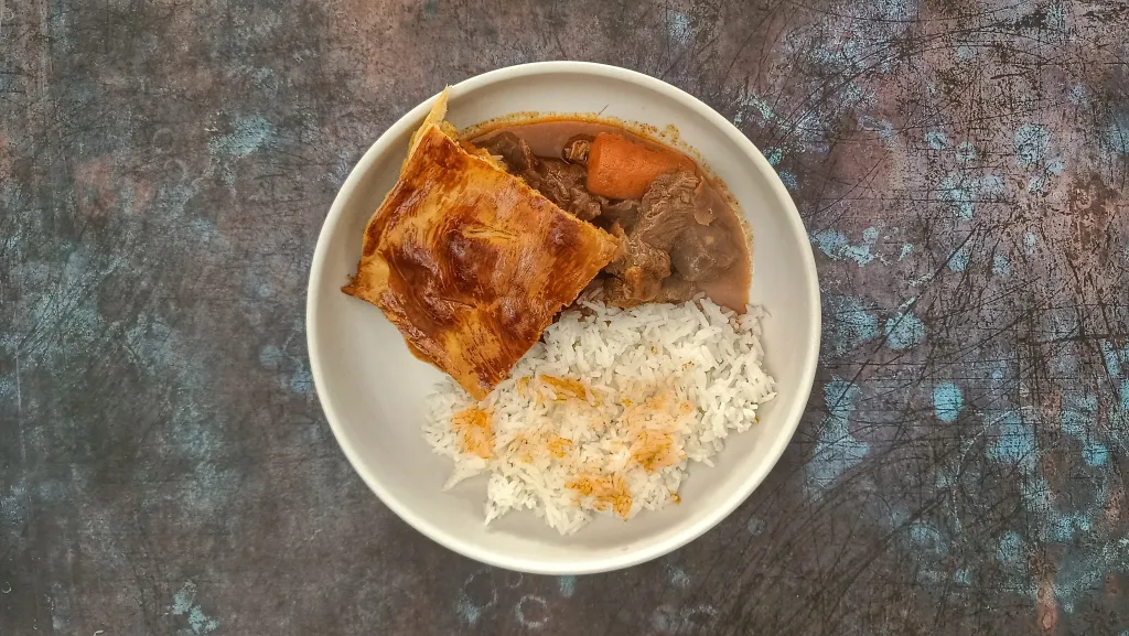Photograph of Bò Kho-style steak and lemongrass pie.