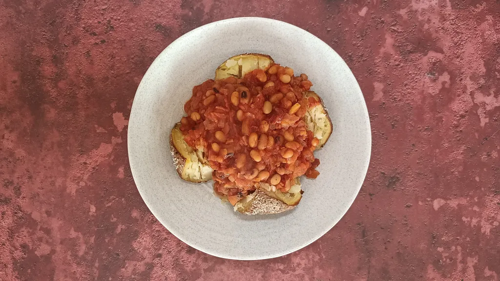 Photograph of Bonfire night maple bacon ‘baked’ beans.