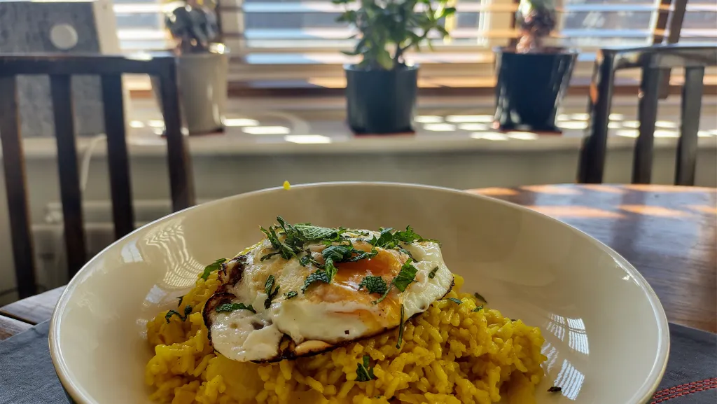 Photograph of Butter curried rice and egg.
