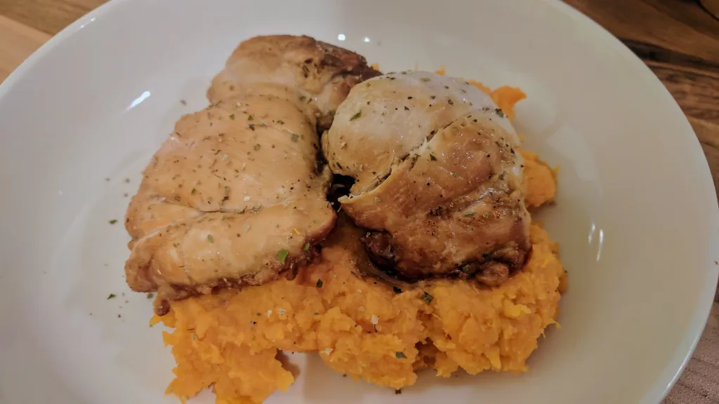 Photograph of Caramel-lime chicken with caribbean mash.