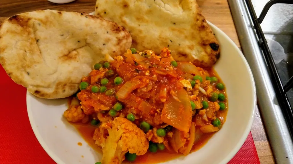 Photograph of Cauliflower, paneer & pea curry.
