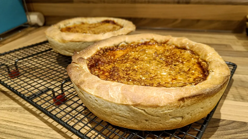 Photograph of Chicago-style deep dish pizza.