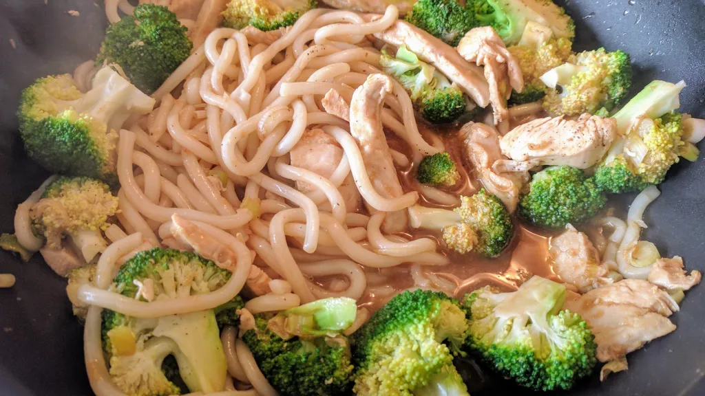 Photograph of Chicken & broccoli noodles.
