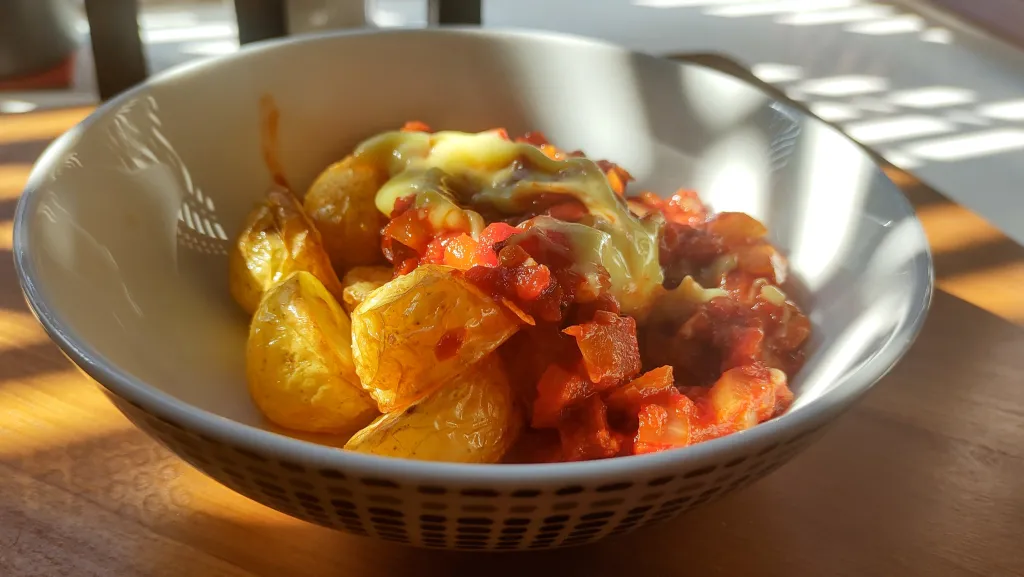 Photograph of Chorizo patatas bravas.