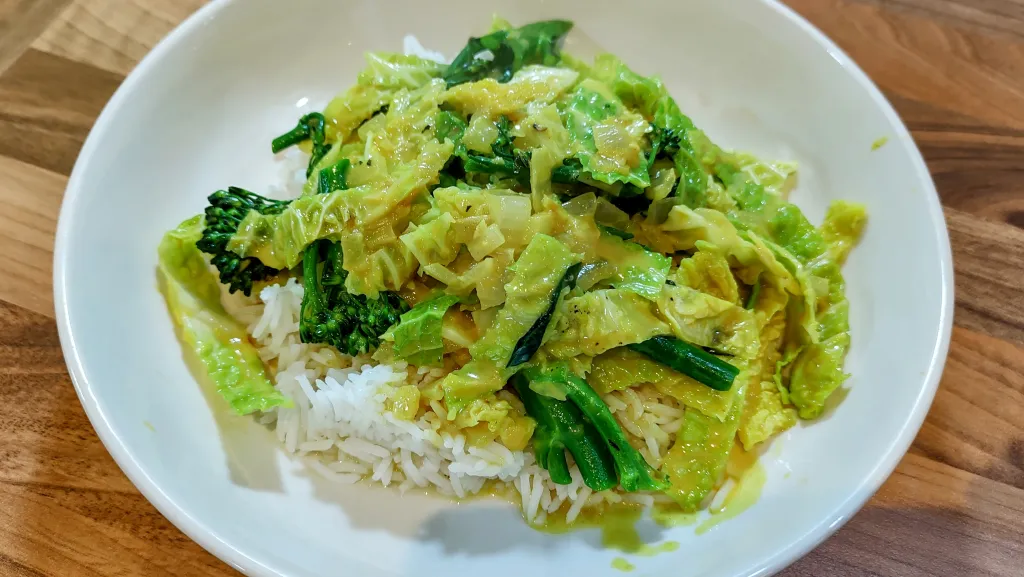 Photograph of Coconut-braised spring greens.