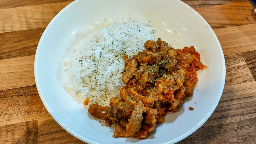 Photograph of Coconut pork stew with garam masala.