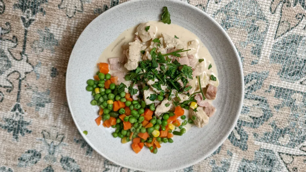 Photograph of Creamy maple and bacon chicken.