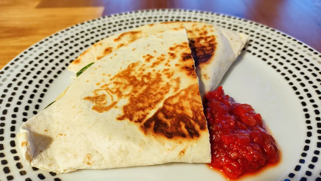 Photograph of Creamy white bean and spinach quesadillas.