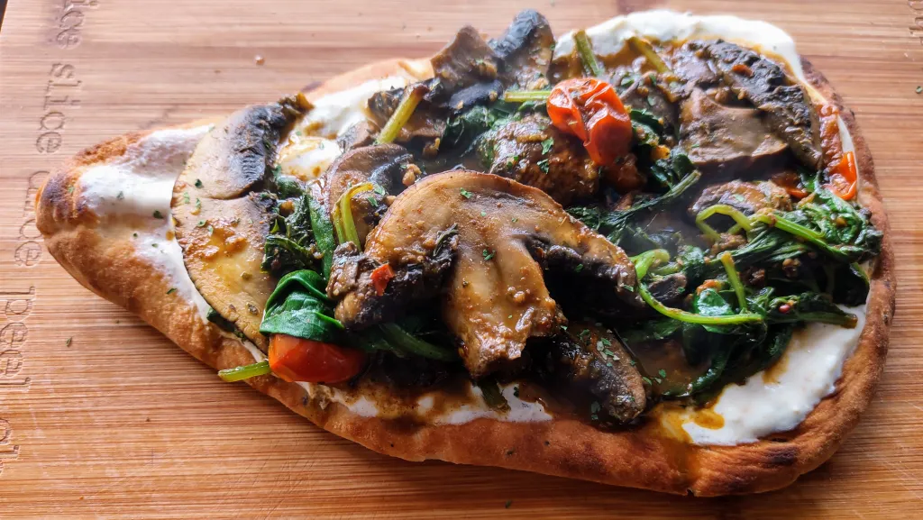 Photograph of Curried mushroom flatbreads.