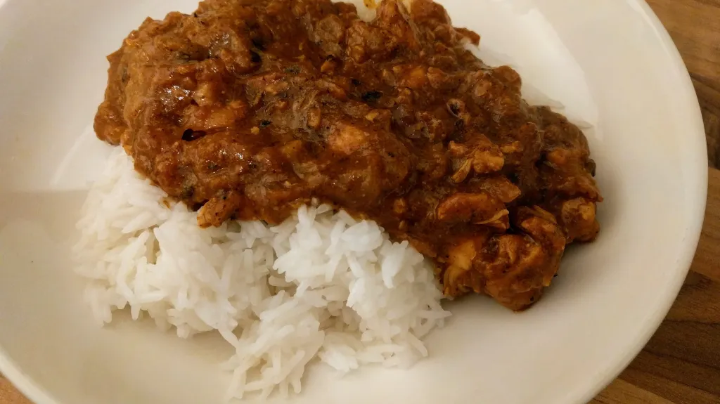 Photograph of Easy chicken tikka masala with basmati rice.