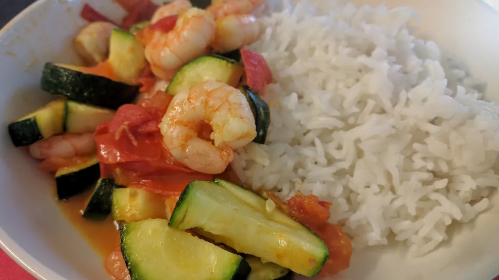 Photograph of Fragrant courgette & prawn curry.