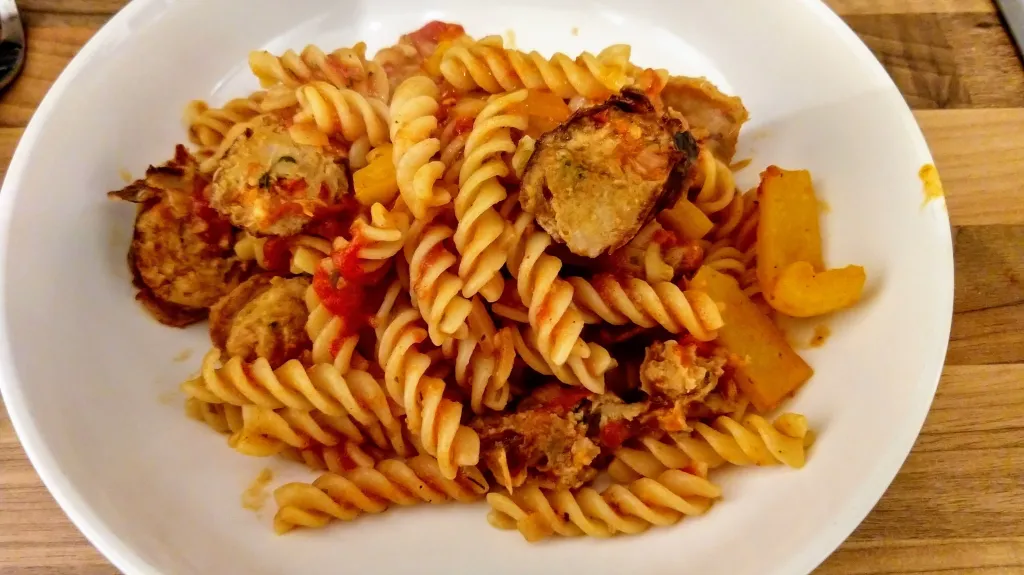 Photograph of Fusilli with sausage.