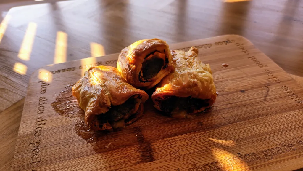 Photograph of Harissa & lamb sausage rolls.