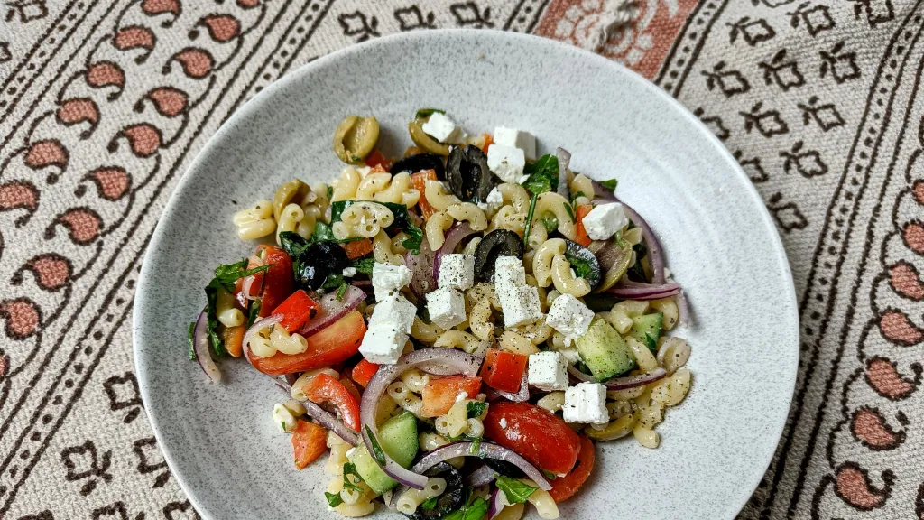 Photograph of Herby olive italian orzo salad.