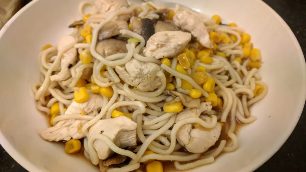 Photograph of Hoisin chicken noodles with ginger and garlic.