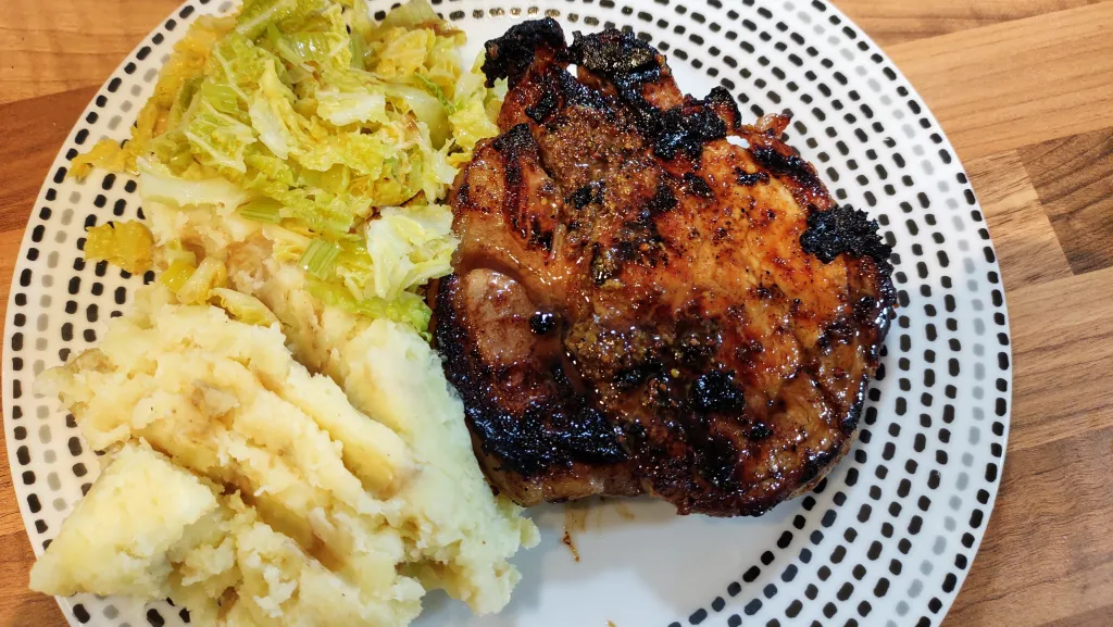Photograph of Honey mustard glazed pork with mash.