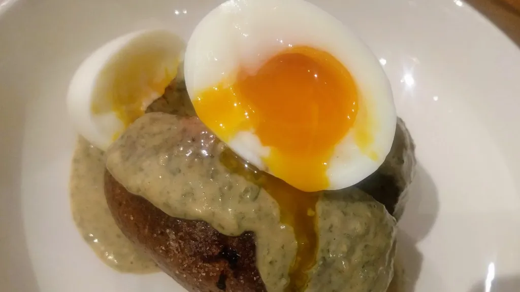 Photograph of Jacket potatoes with egg and tonnato sauce.