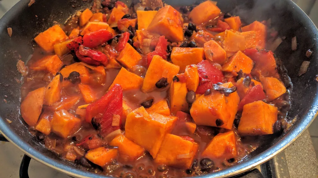 Photograph of Jerk sweet potato & black bean curry.