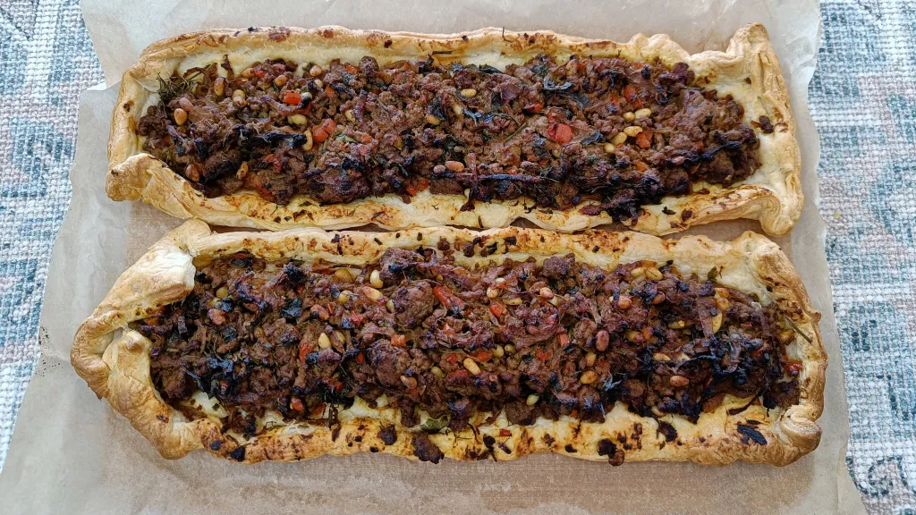 Photograph of Lazy beef & caramelized onion pide.