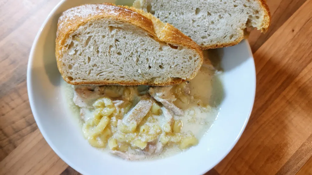 Photograph of Lemon garlic chicken orzo soup.