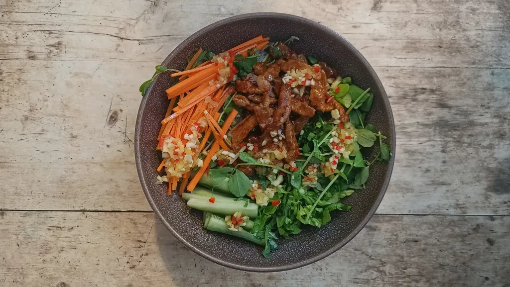 Photograph of Lemongrass and pineapple beef vermicelli salad.