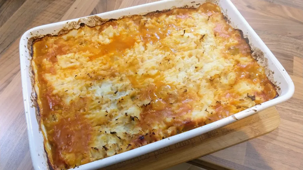 Photograph of Lentil shepherds pie with celeriac & butter bean mash.