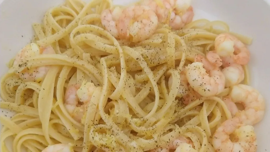 Photograph of Linguine with garlic butter prawns.