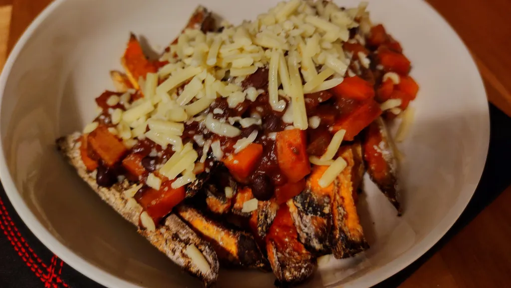 Photograph of Loaded chilli sweet potato fries.