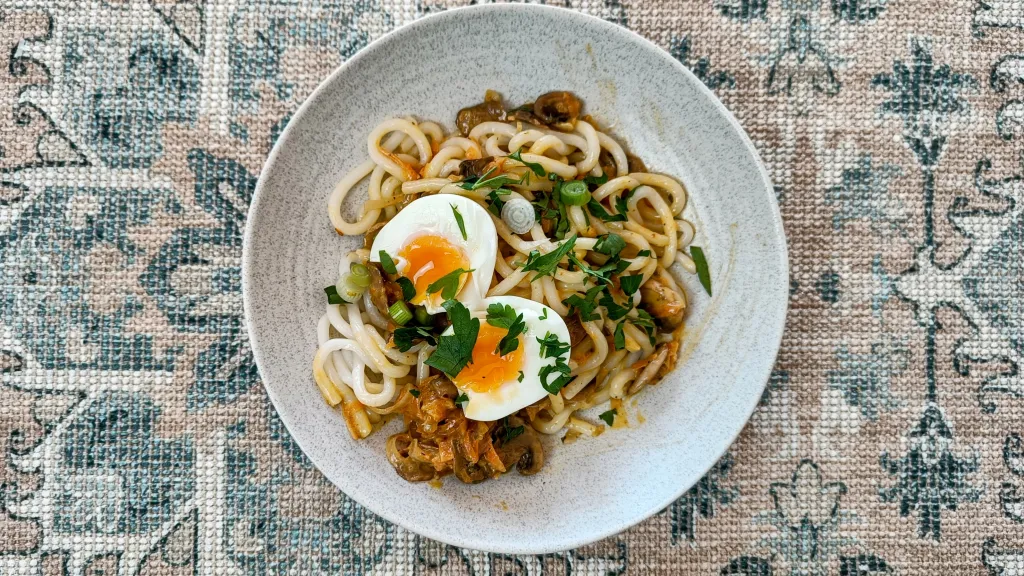 Photograph of Malaysian red curry noodles.