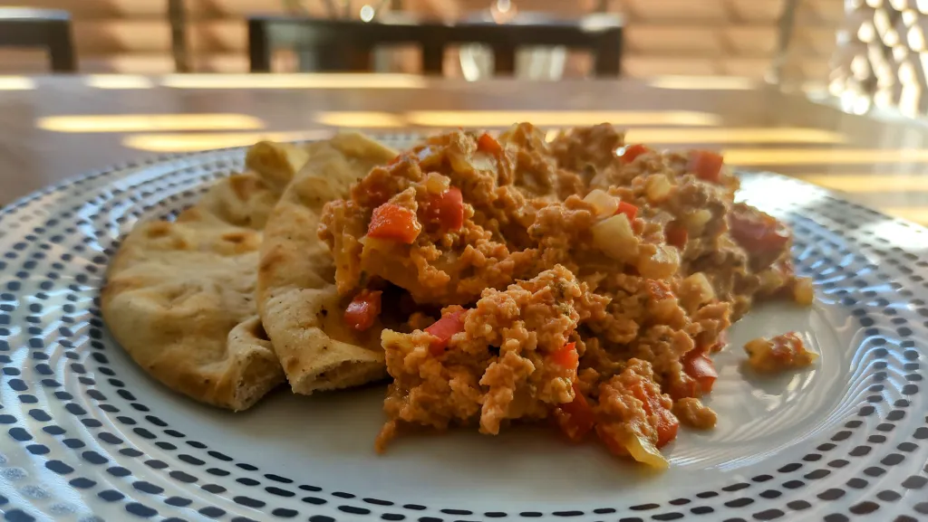 Photograph of Menemen (turkish scrambled eggs with tomato).