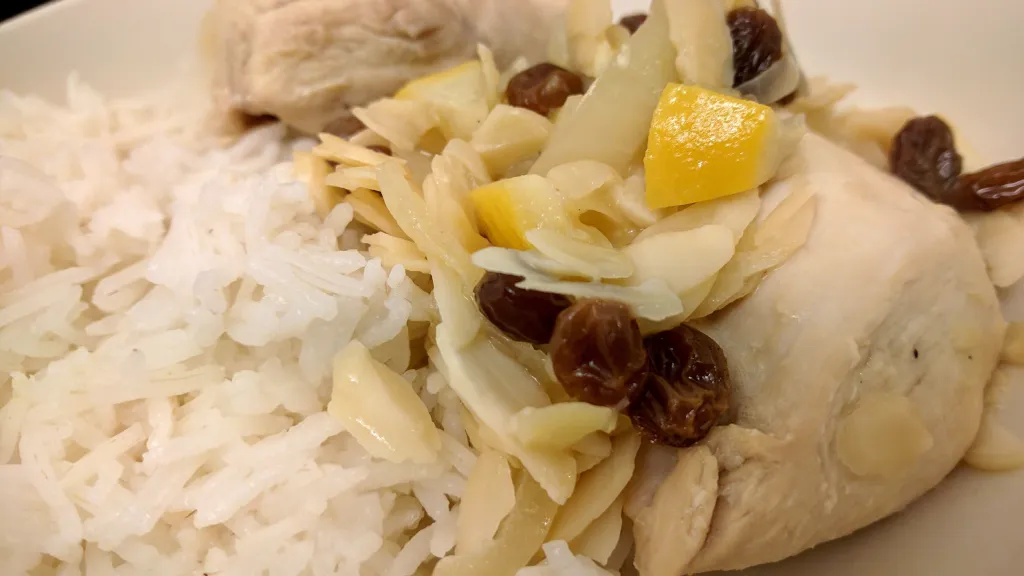 Photograph of Moroccan chicken with green olives and lemon.