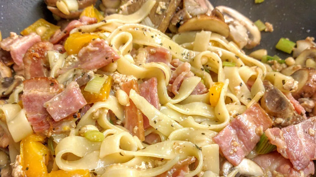Photograph of Mushroom and bacon tagliatelle.