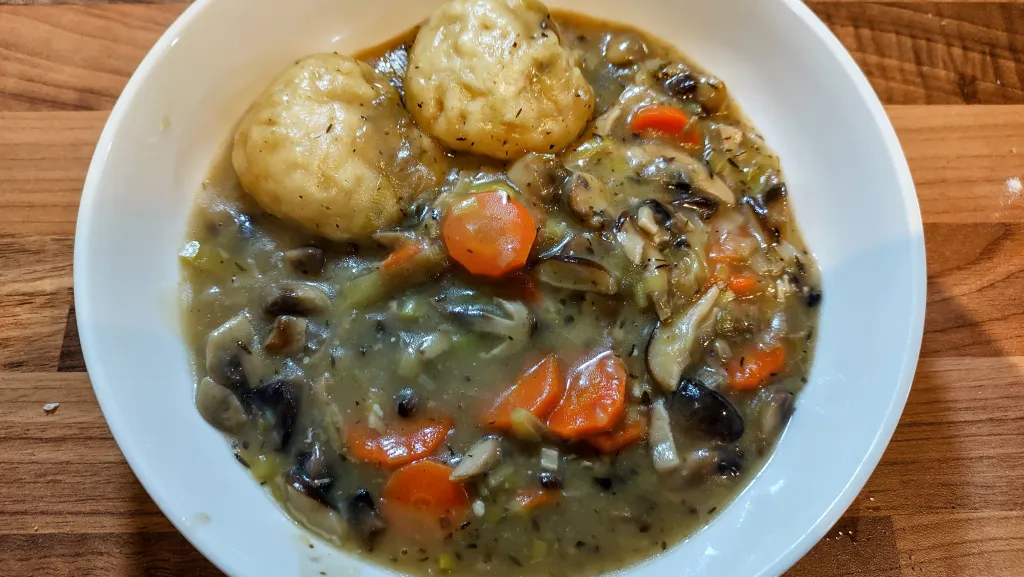 Photograph of Mushrooms and dumplings.