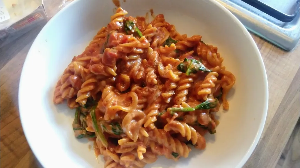 Photograph of One pot pasta with tomato & mascarpone sauce.