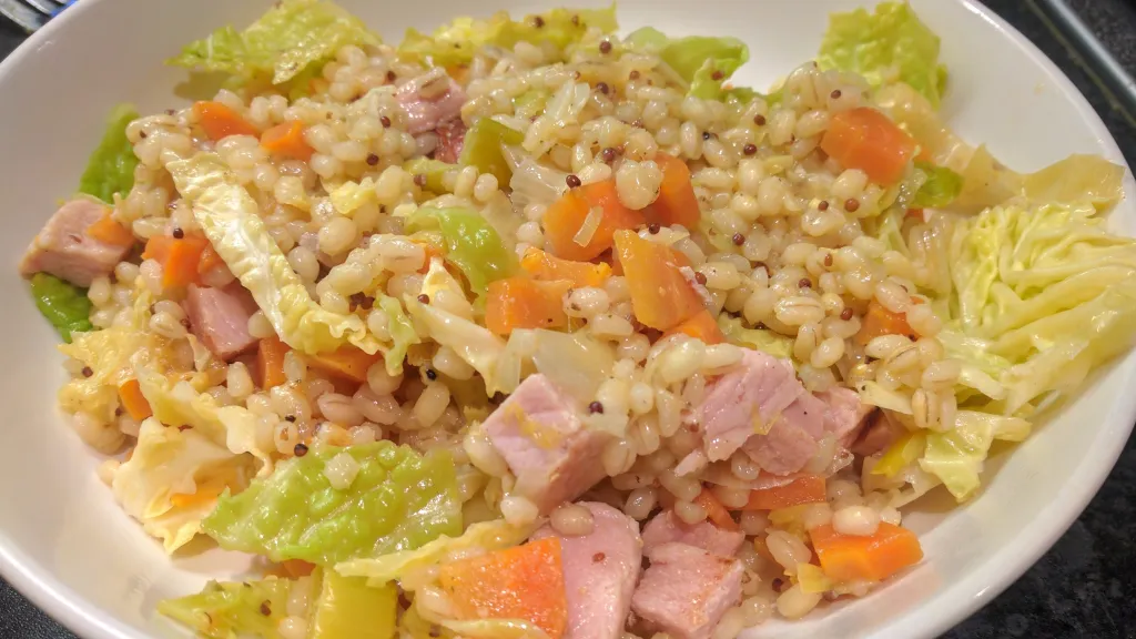 Photograph of Pearl barley, bacon & leek casserole.