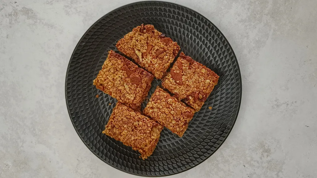 Photograph of Pecan and ginger flapjacks.
