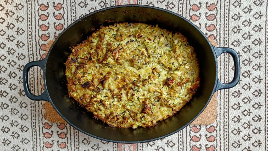 Photograph of Pesto, courgette & wild rice gratin.