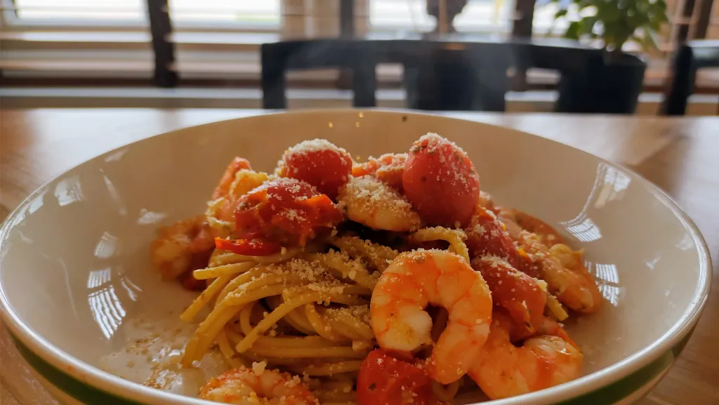 Photograph of Pesto shrimp pasta.