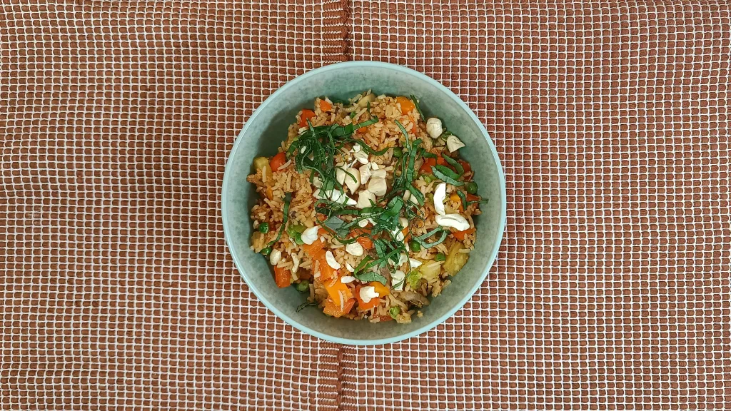 Photograph of Pineapple fried cauliflower rice bowl.