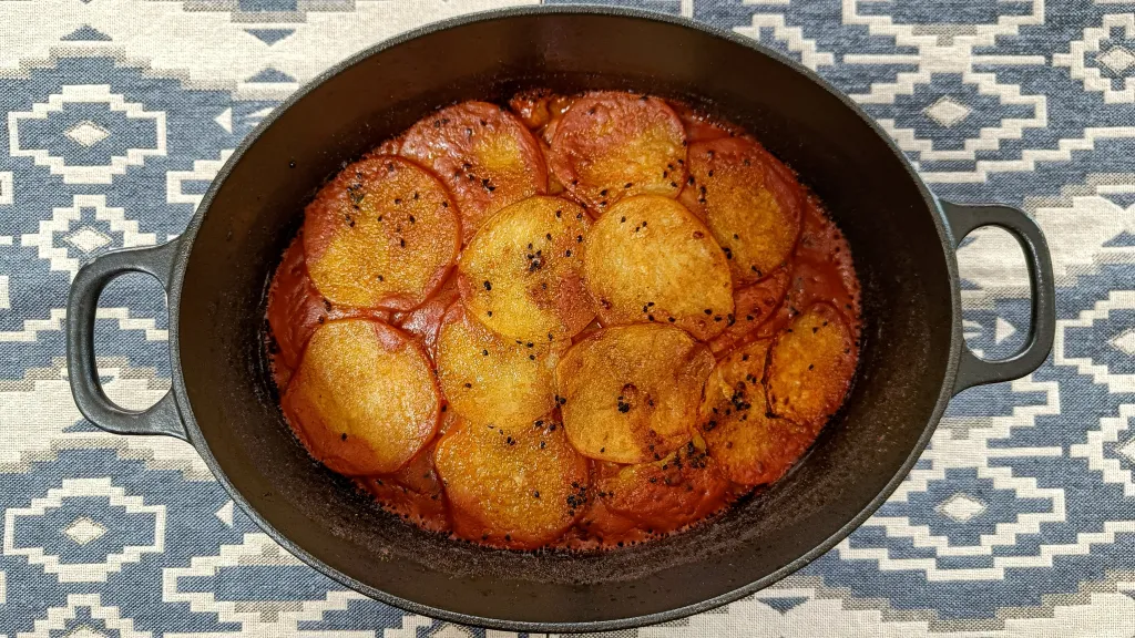 Photograph of Potato-topped spiced chickpeas.