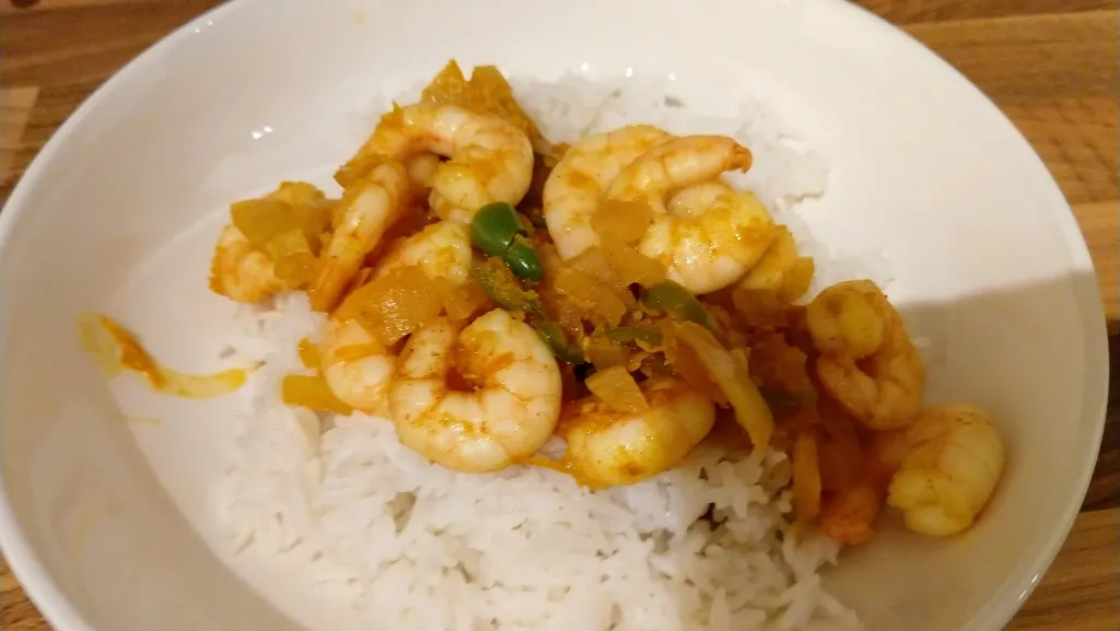 Photograph of Prawn & orange curry with basmati rice.