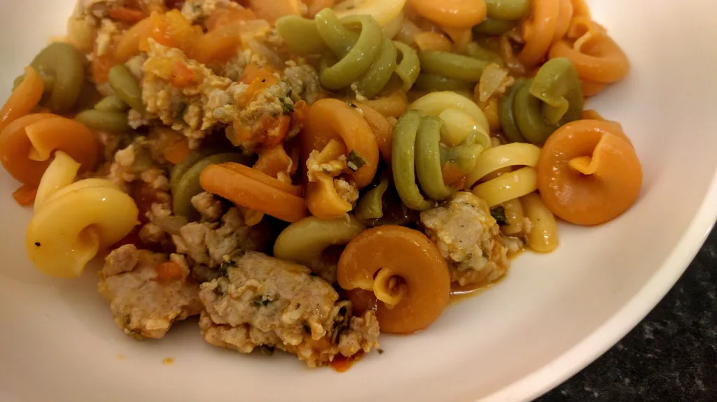 Photograph of Sausage and trottole pasta.